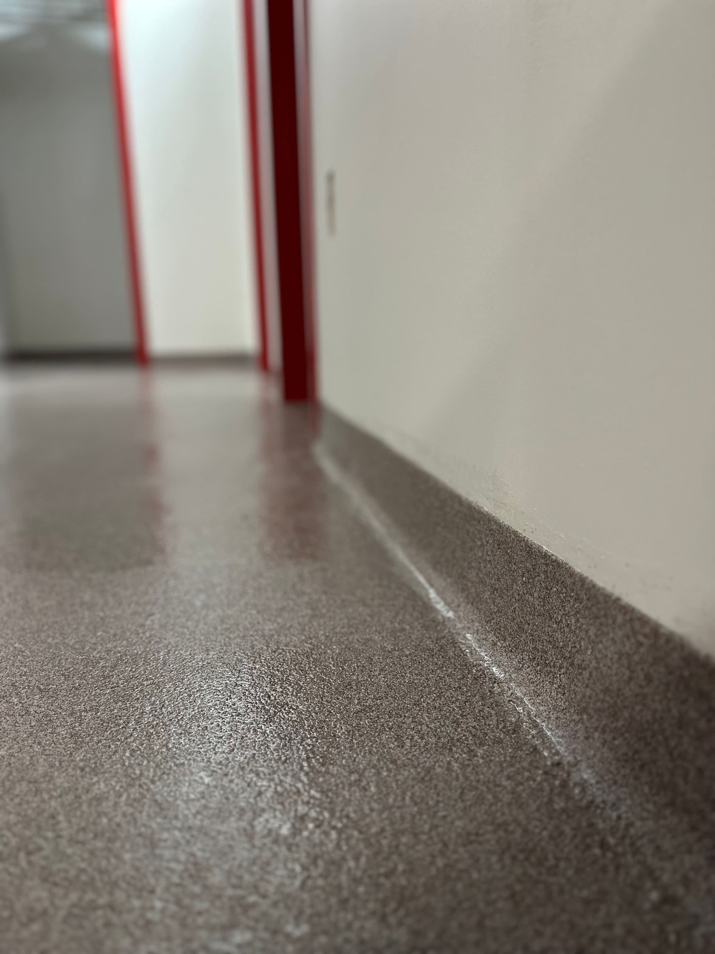 Commercial corridor with flake epoxy floor