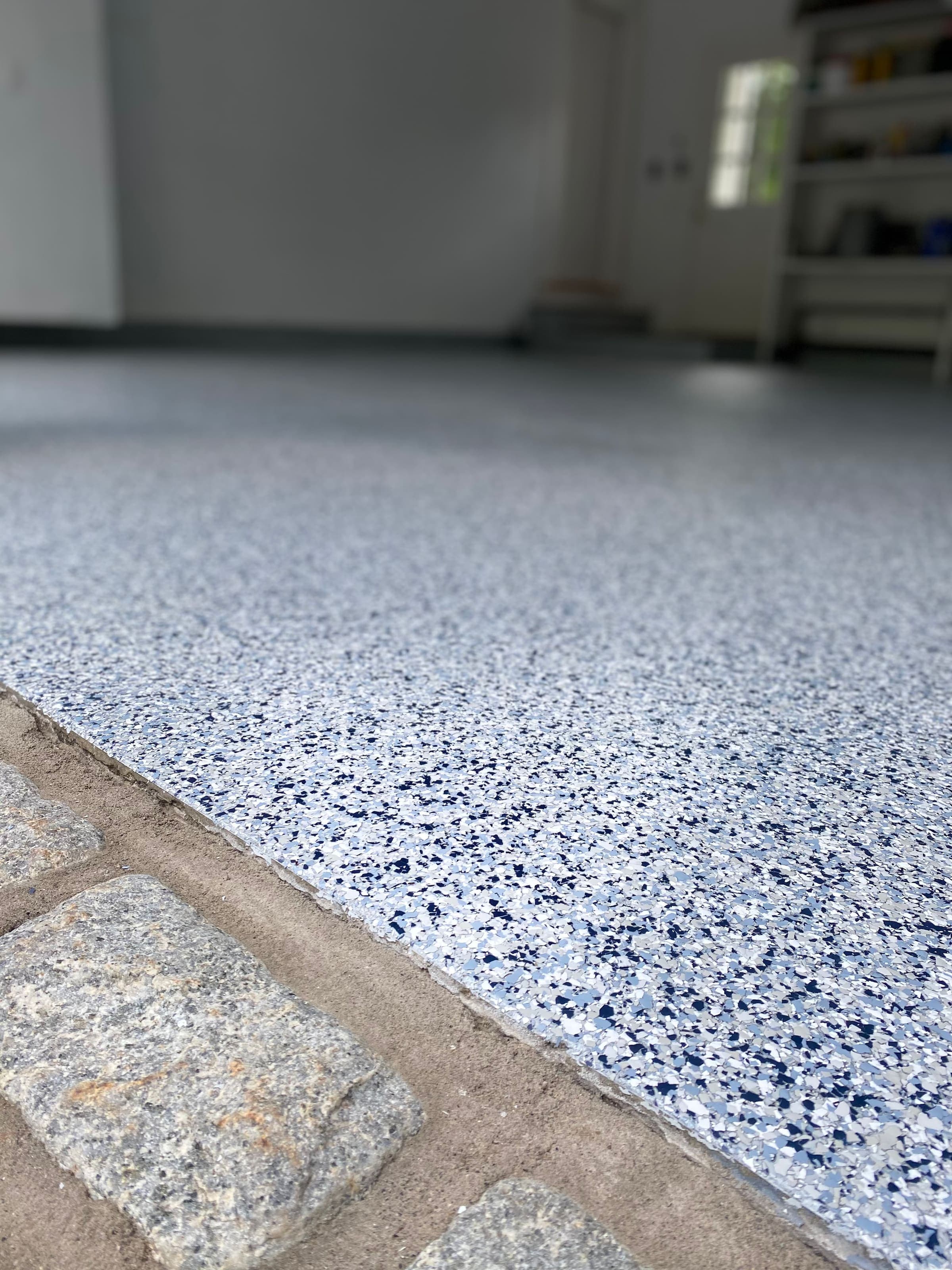 Freshly poured flake epoxy garage floor