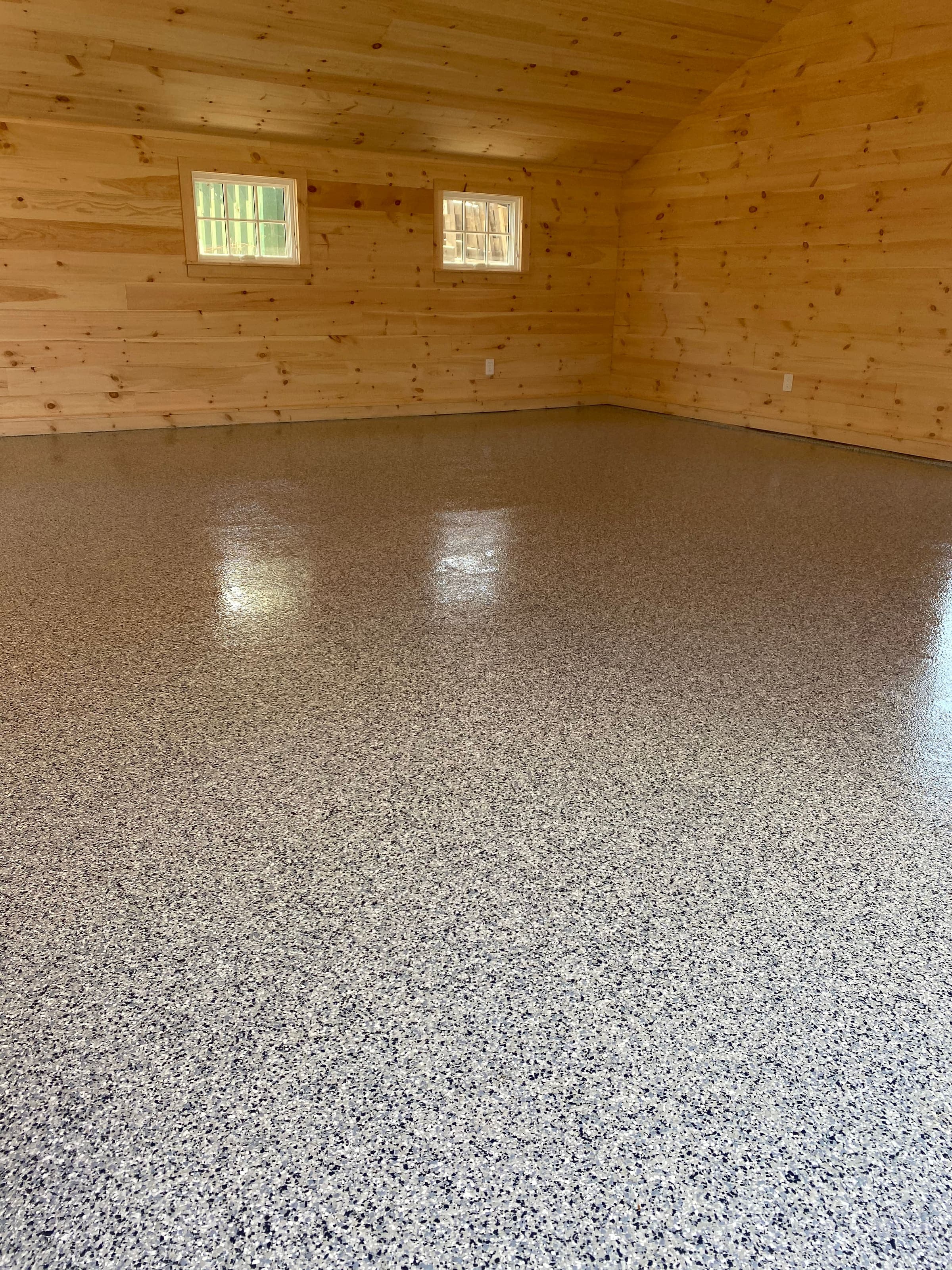 Sunroom with flake epoxy floor and large windows