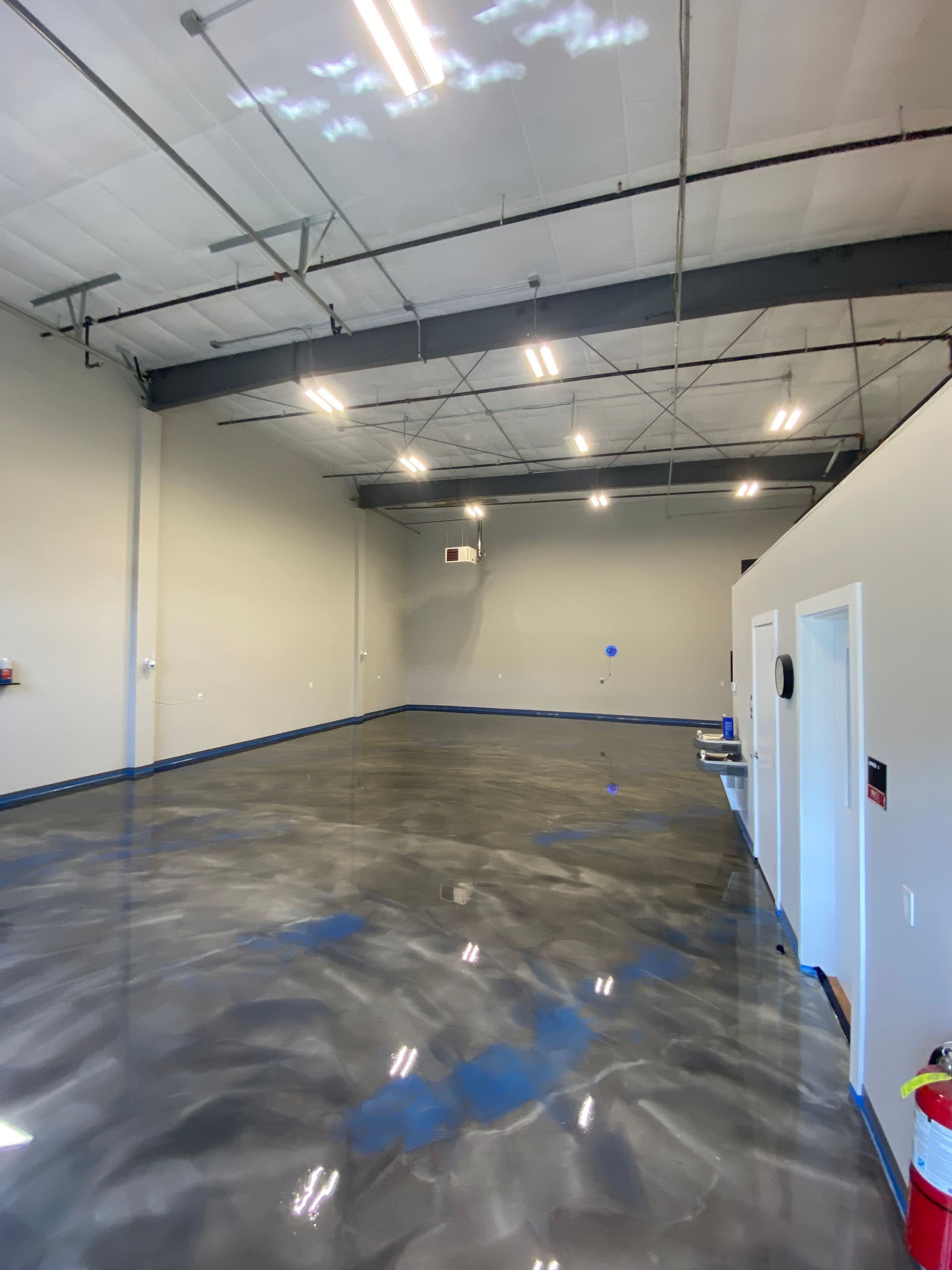 Silver metallic epoxy in a commercial space